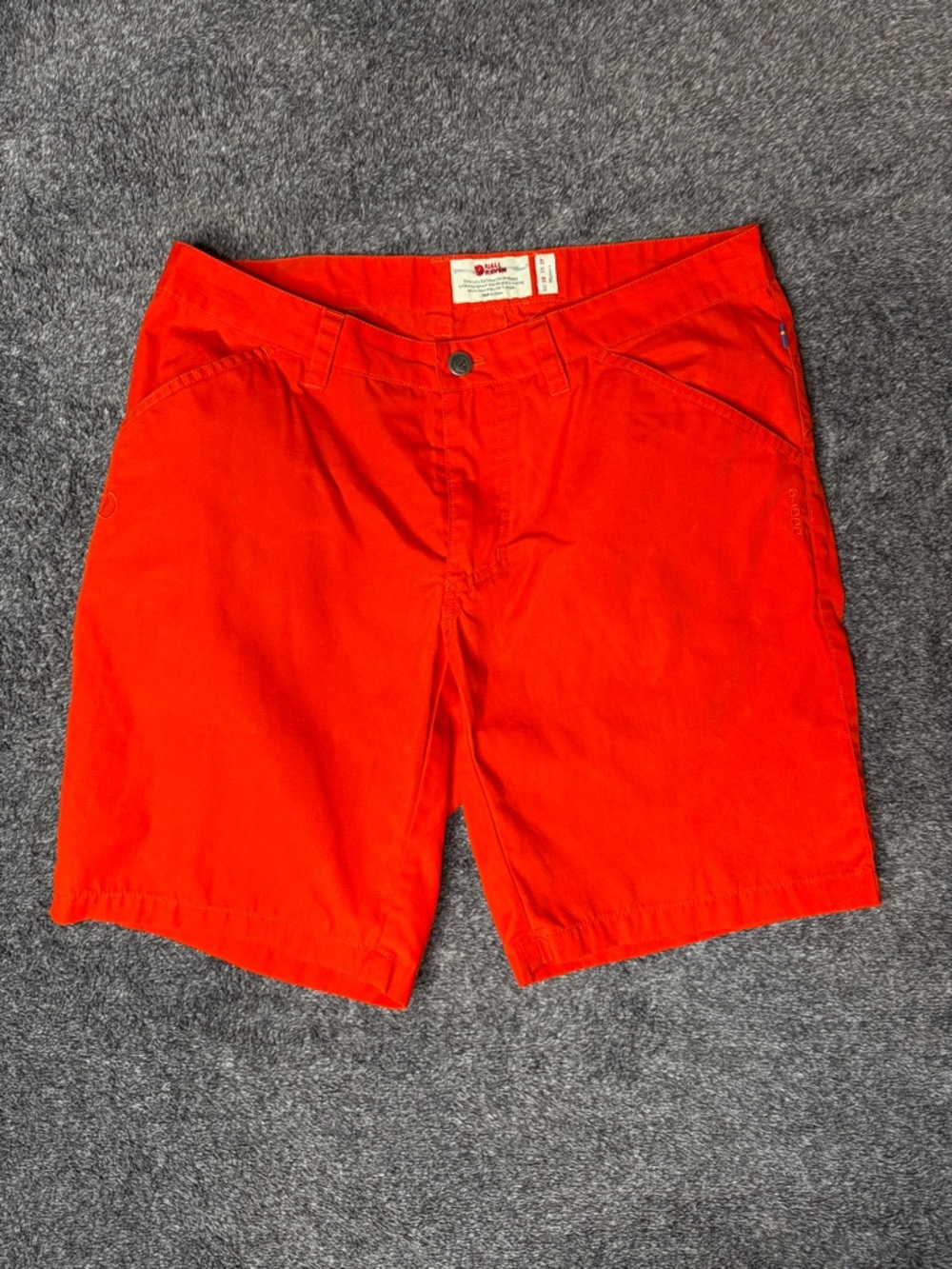 Fjallraven Bright Orange High Coast Light Shorts.
